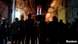 Foto Archivo. Cubanos en una reunión del CDR en septiembre de 2019. Las asambleas de rendición de cuentas han sido postergadas nuevamente ante el creciente malestar popular generado por el paquetazo. REUTERS/Alexandre Meneghini