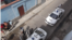 Autos policiales a la puerta del domicilio del periodista independiente guantanamero Roberto Jesús Quiñones (foto del autor).