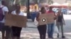 Protesta frente al Parque de la Fraternidad para exigir la liberación de los activistas de UNPACU. (Captura de video/Facebook)